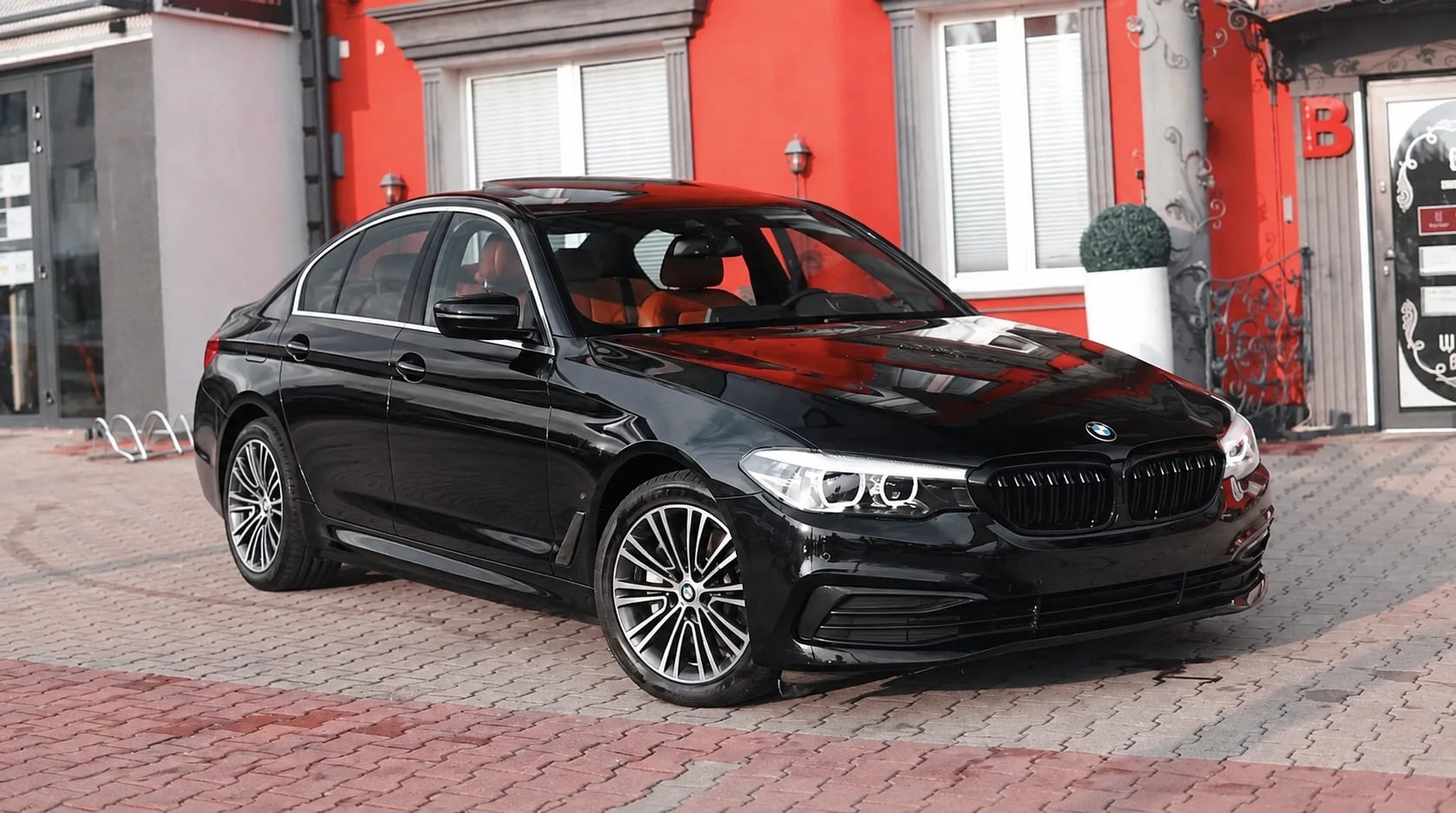 BMW 530i xDrive for rent in Warsaw, front three-quarter view